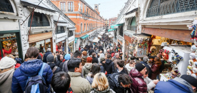 Rialto Bridge, Venice. Crowds shopping on the Rialto Bridge, Venice, Italy.